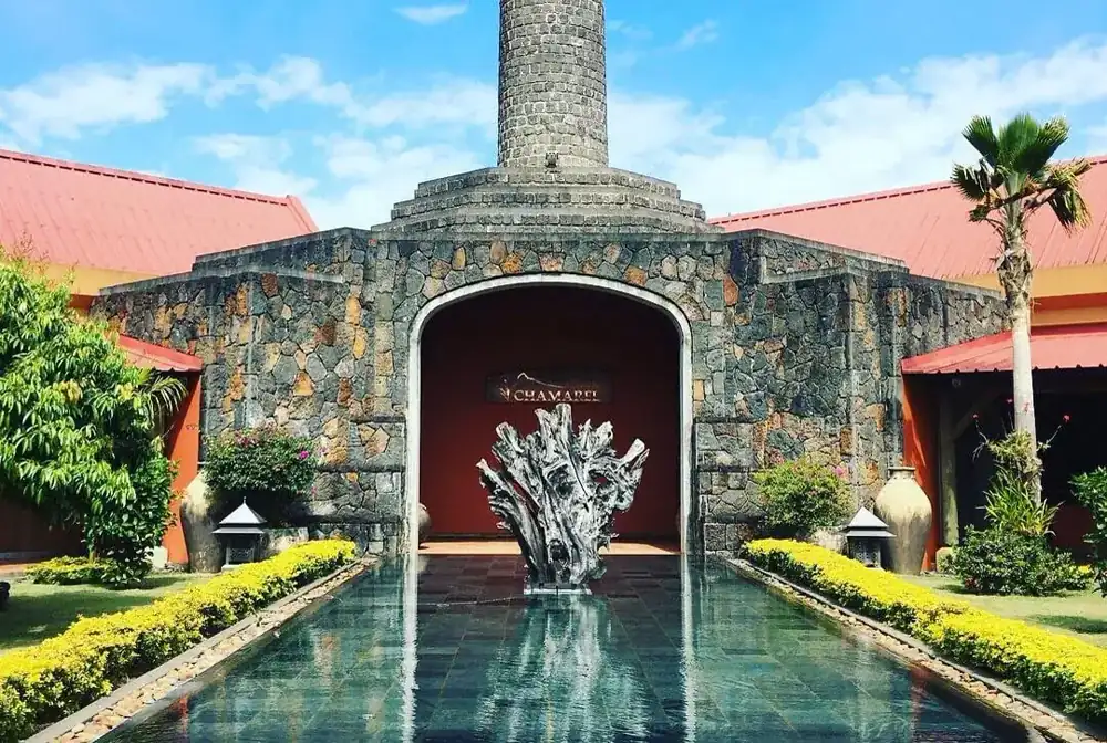 Stone entrance and fountain at a historic estate attraction